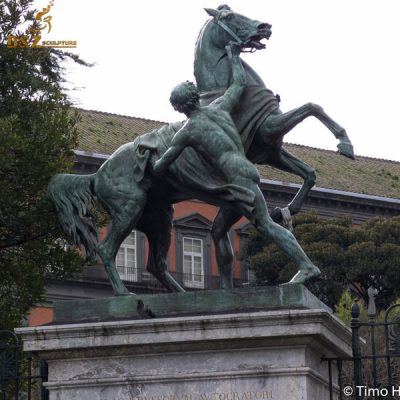 greek horse with man statue